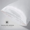 A white silky satin pillow cover shown folded, highlighting the envelope design for easy on and off.