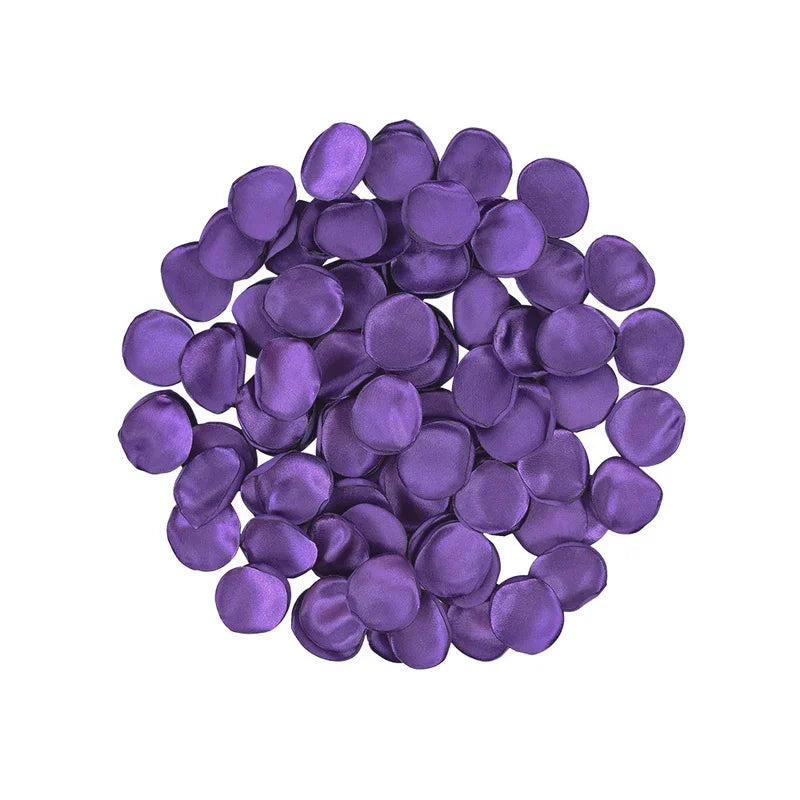 A pile of 100 deep purple silk rose petals for weddings and events.