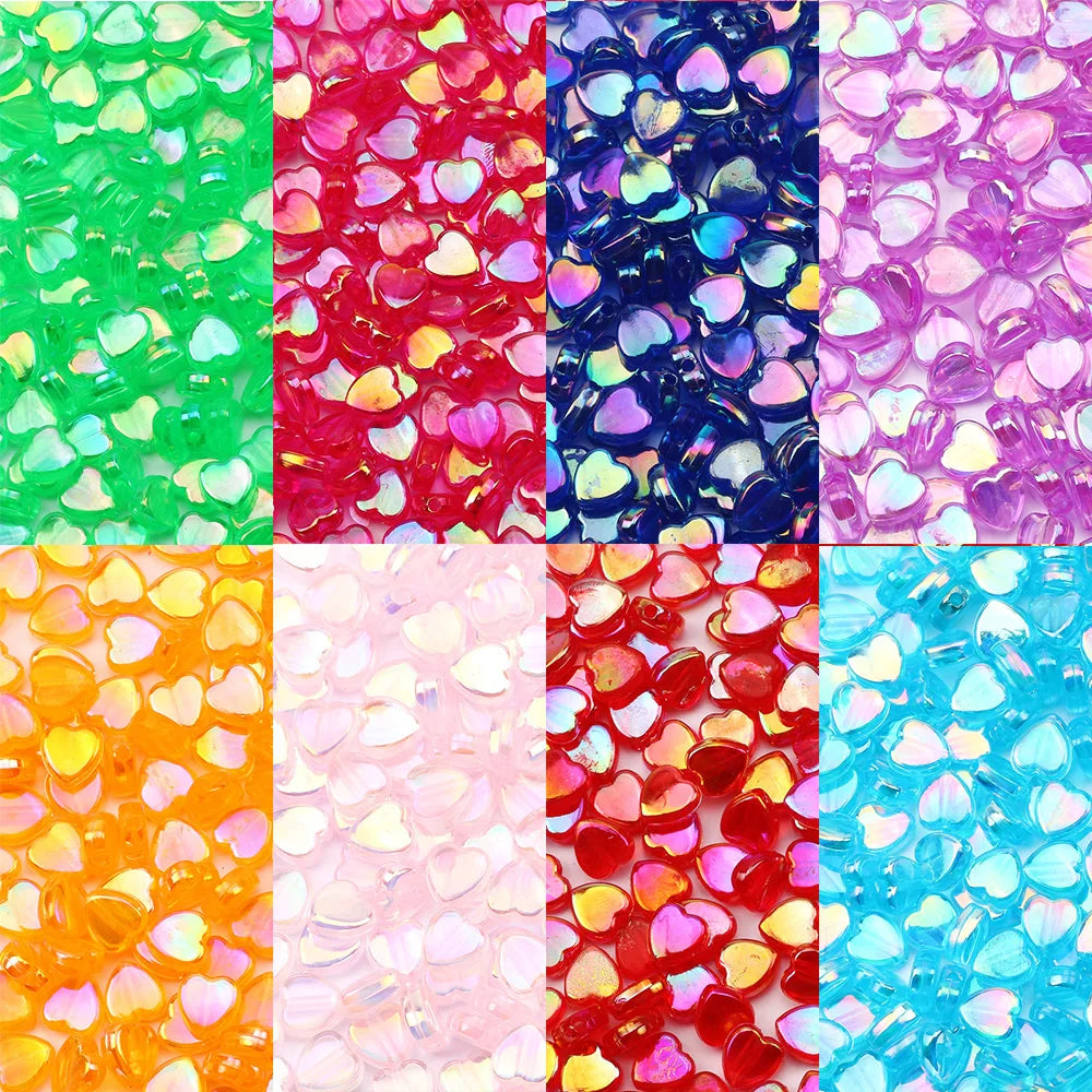 A grid of colorful acrylic heart beads in various shades including green, red, blue, purple, orange, and pink.
