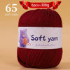 A ball of 65 soft red yarn, labeled as handmade knitting thread, ready for crafting.