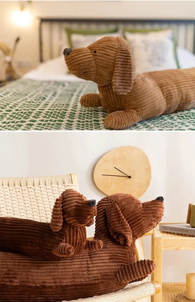 A brown corduroy dachshund body pillow resting on a light-colored surface.