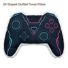 A dark blue and black 3D shaped stuffed throw pillow designed like a video game controller.