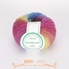 A ball of multi-colored wool yarn with a label indicating 30g and 180m length.