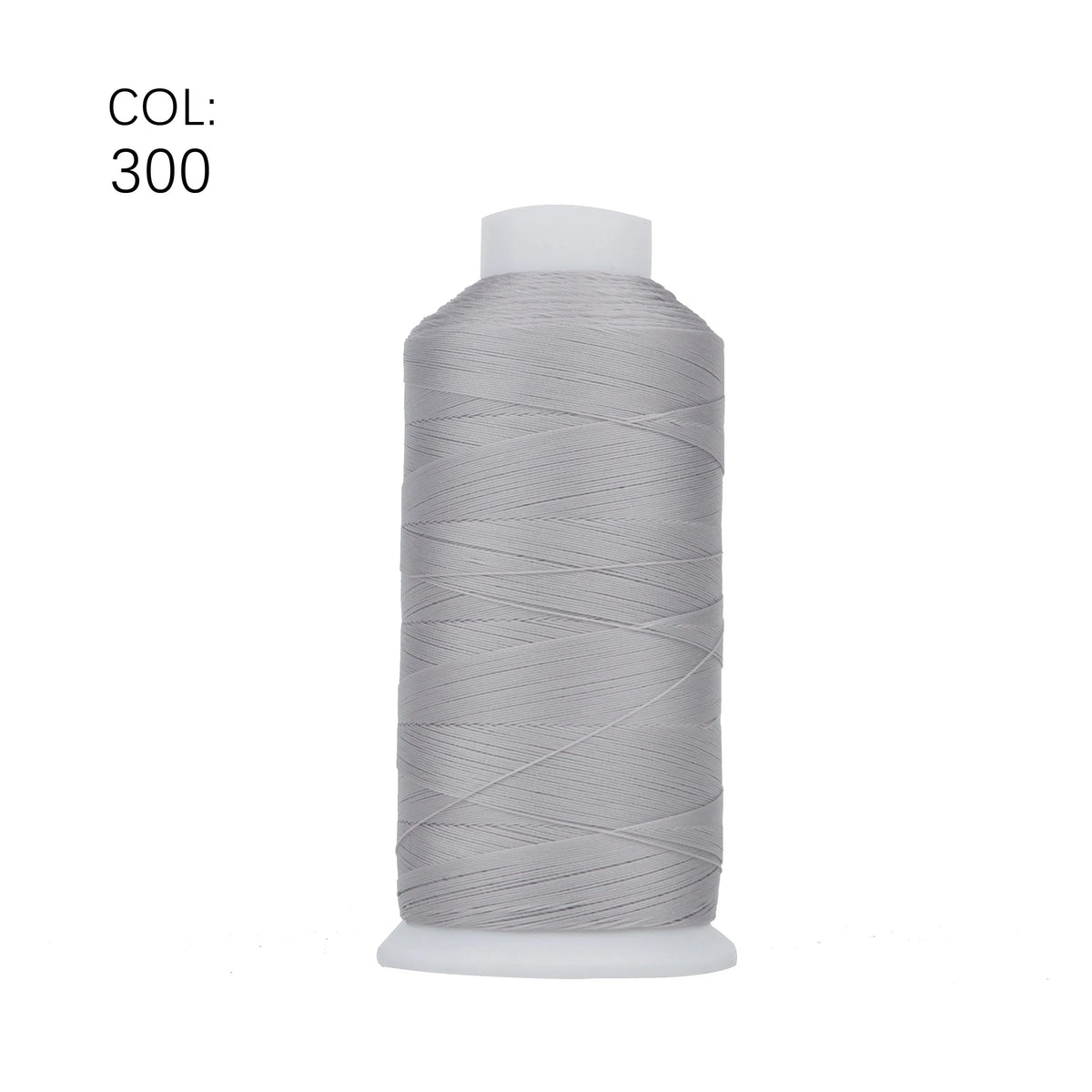 A spool of gray heavy duty nylon sewing thread with a white core.