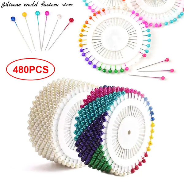 A set of 480 pearl head pins for sewing and crafting, featuring various colors like white, green, purple, and yellow.