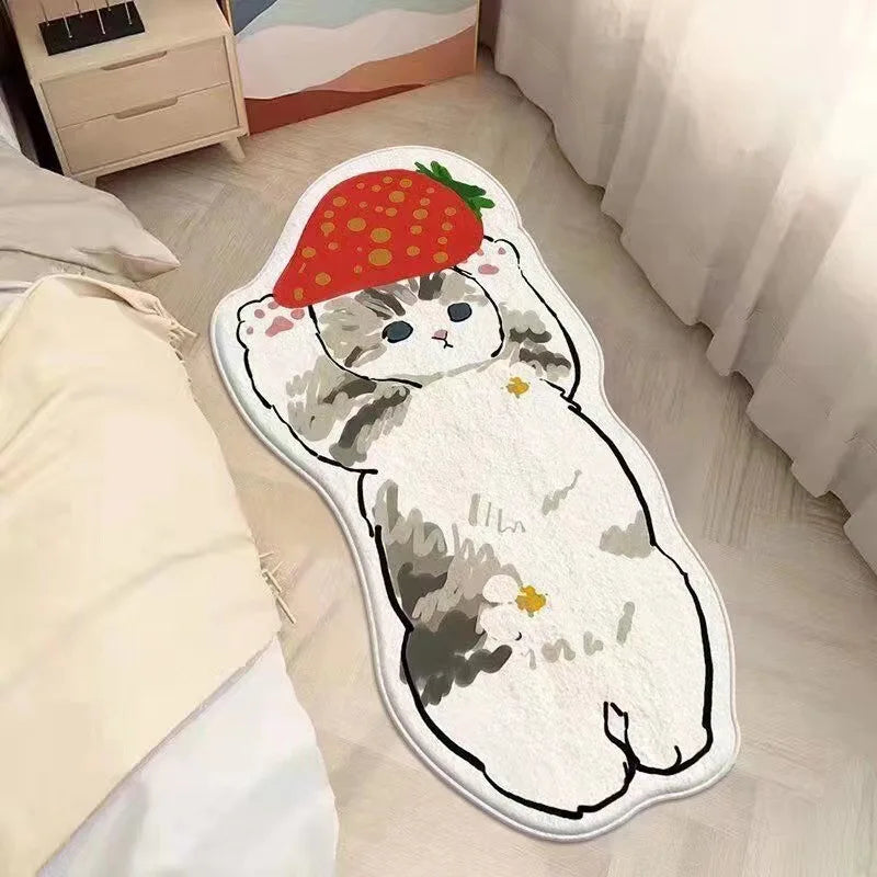 A white plush carpet mat featuring a cartoon cat and a strawberry design.