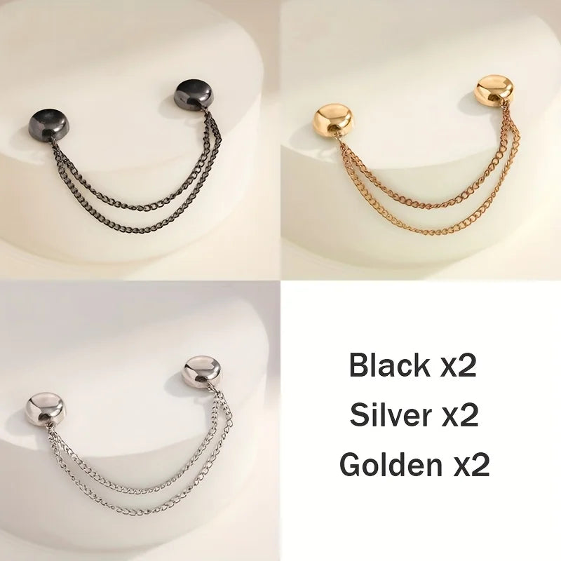 A collection of magnetic clothing adjustment buttons in black, silver, and gold tones displayed on a white background.