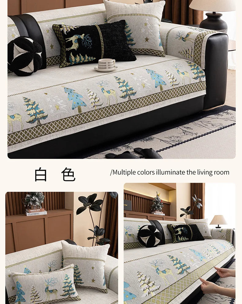 A beige sofa mat cover featuring a Christmas deer pattern and various floral accents on a light gray fabric.