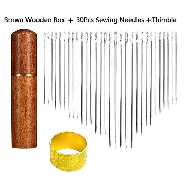 Brown wooden box containing 30 sewing needles and a thimble for a precision self-threading kit