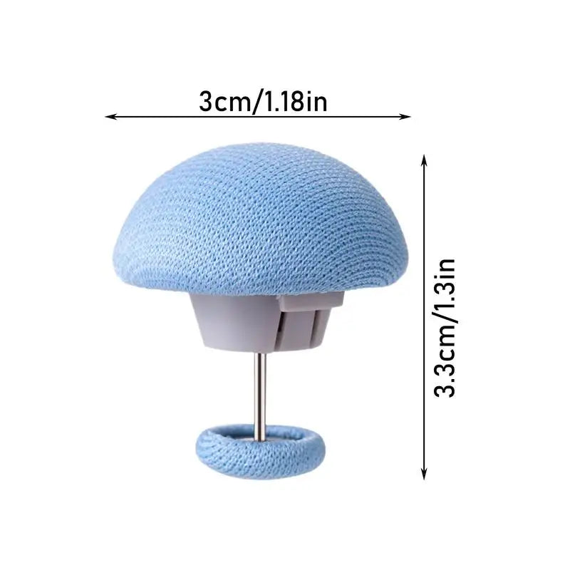 A light blue, mesh-covered duvet cover clip with a silver stand.