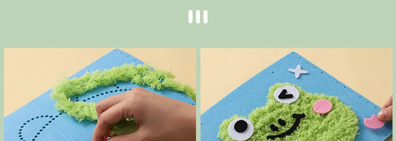 A hand is pressing green felt onto a blue craft mat to create a felt animal character.