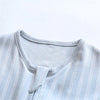 Light blue cotton striped sleeping bag for children shown from the chest area.