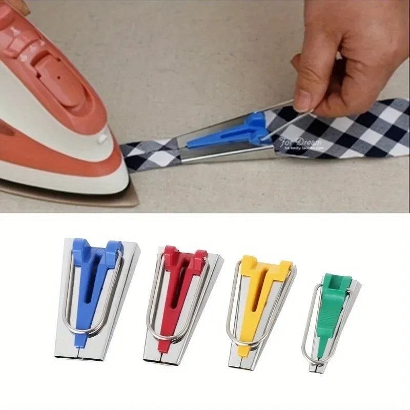 A set of five bias tape makers with awl tools in various colors including blue, red, yellow, and green.