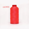 A spool of bright red heavy duty nylon sewing thread labeled col.954.