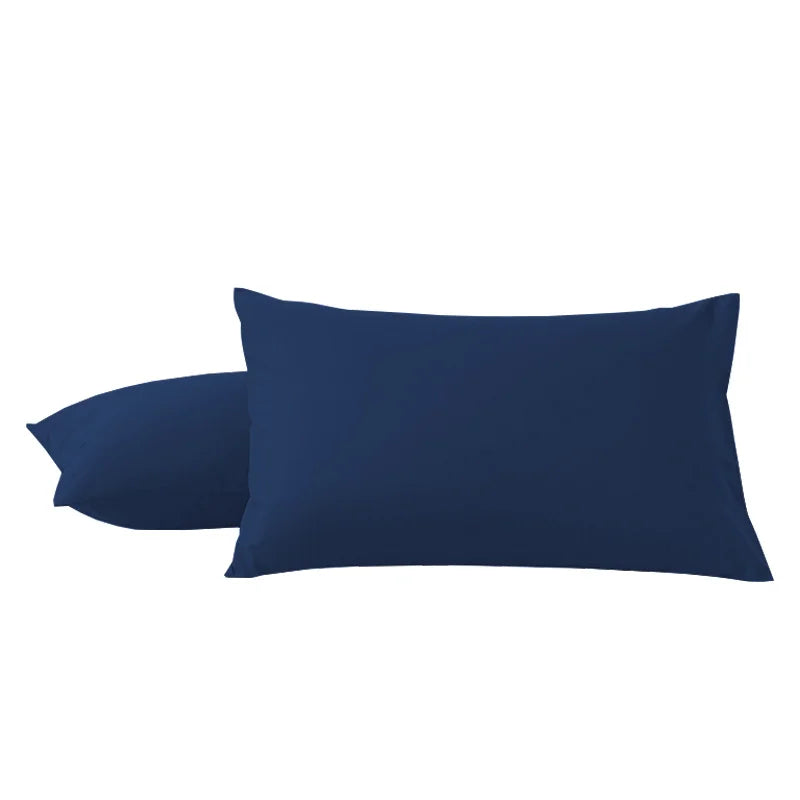 A pair of dark navy blue microfiber pillow covers.