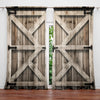 A pair of rustic wooden barn doors with diagonal cross bracing and dark fabric panels.