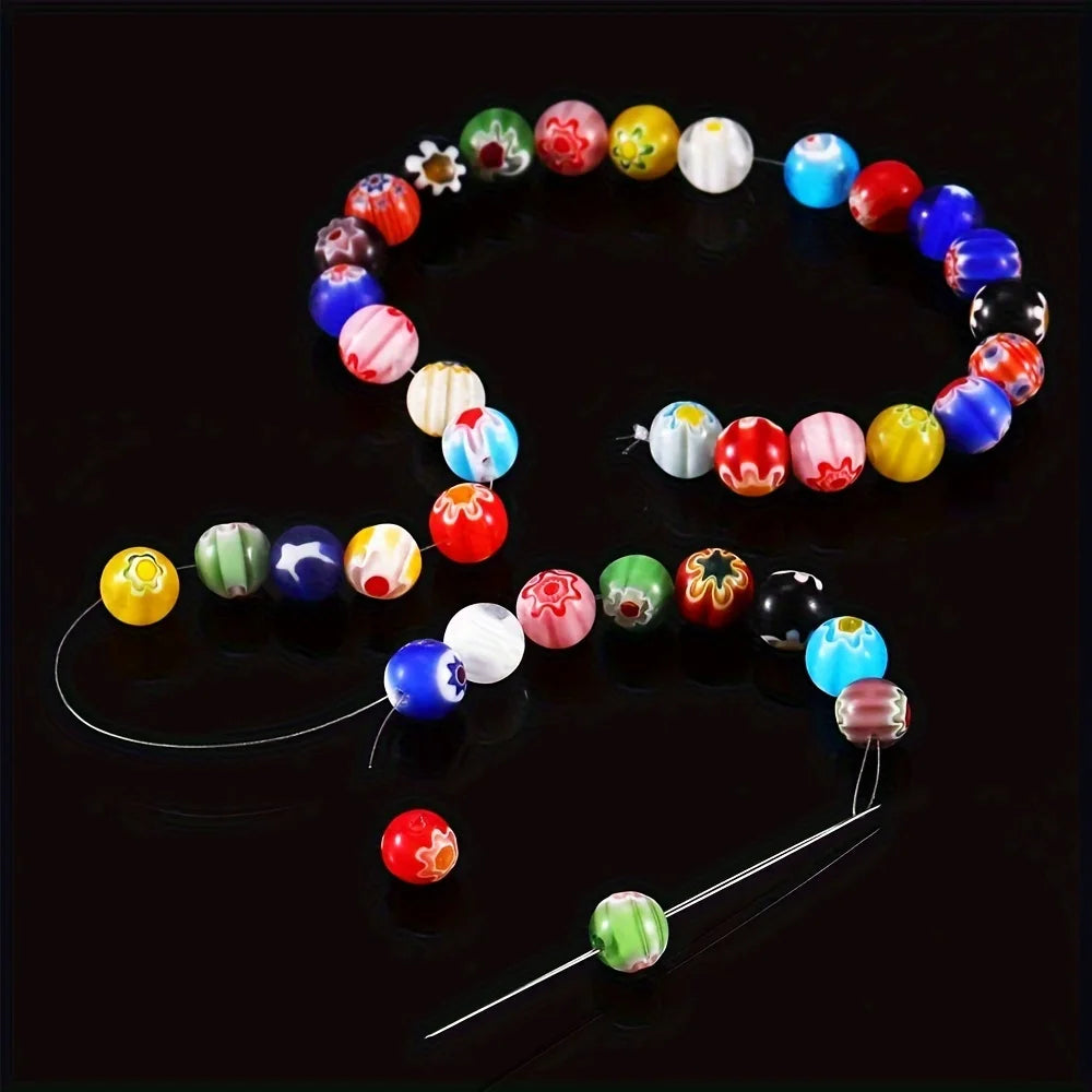 A circular arrangement of colorful, round beads on a thin nylon thread.