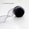 A roll of sheer black silky organza ribbon, measuring 4 by 10 yards (9 meters).