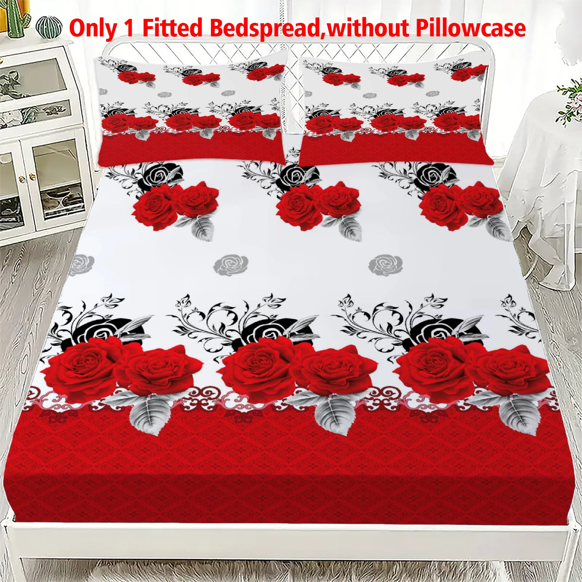 A red rose printed fitted bedspread without a pillowcase displayed on a white bed frame.
