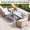 Wicker outdoor sofa cushion covers in beige and white protecting patio furniture.