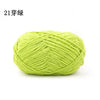 A ball of bright lime green 21-ply matte chenille yarn for knitting and crochet.