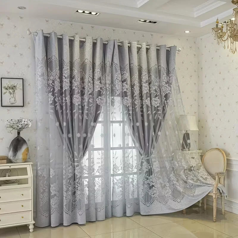 Gray vintage floral blackout curtains hanging in a bright room with sheer overlay.