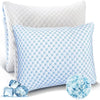 A light blue patterned memory foam pillow next to ice cubes.