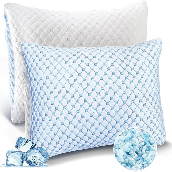 A light blue patterned memory foam pillow next to ice cubes.