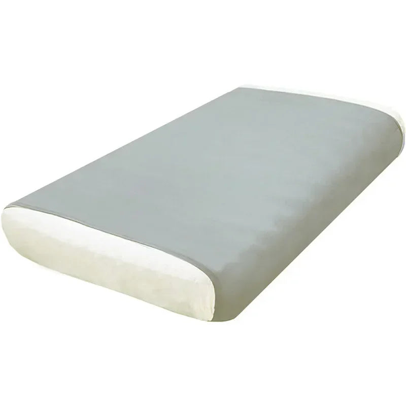 A rectangular, light gray sensory bed sheet with a white border.