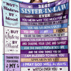 A purple throw blanket featuring text about sister-in-law relationships and family bonds.