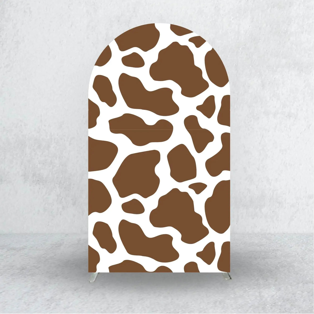 A brown and white leopard print fabric cover shaped like an arch backdrop for events.