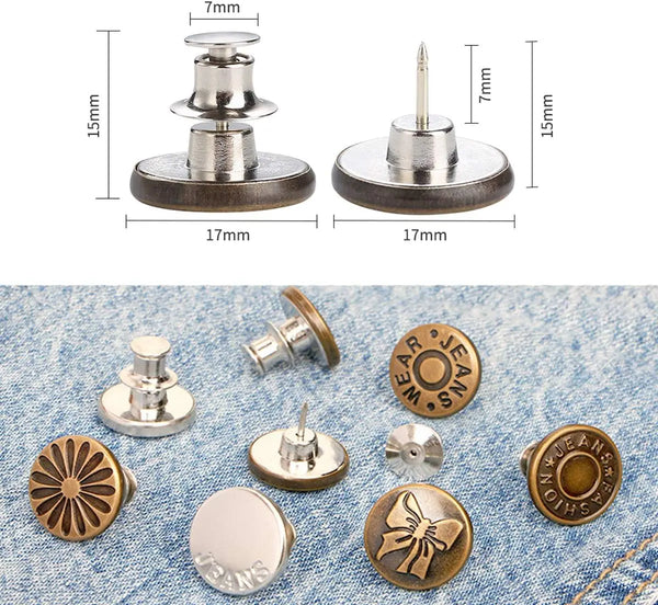 A collection of adjustable button pins and clothing pins made of metal on a denim background.