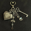 Silver star pocket watch keychain featuring an adjustable clock mechanism and decorative elements.