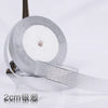 Roll of silver glitter organza ribbon for gift wrapping and DIY crafts