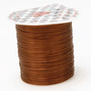 A spool of multicolor elastic beading cord with a decorative label on top.