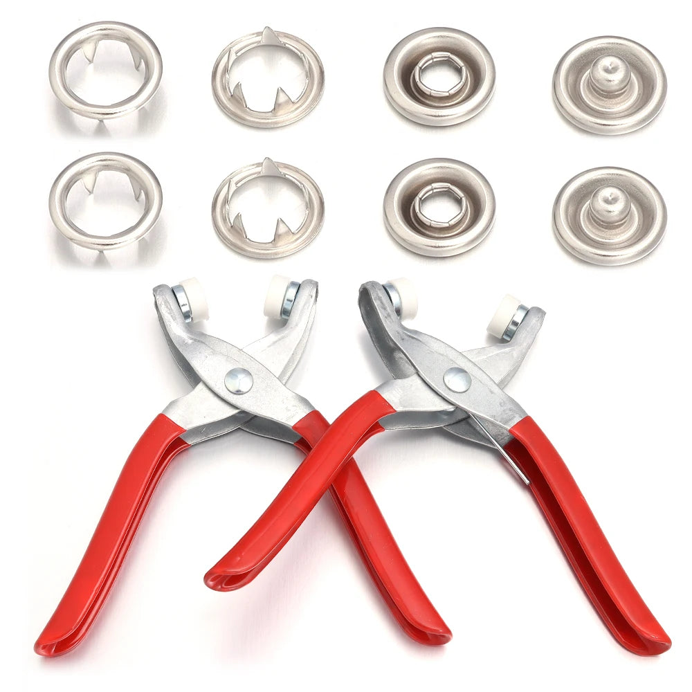A set of precision iron snap buttons in silver and gold tones, along with two red-handled pliers.