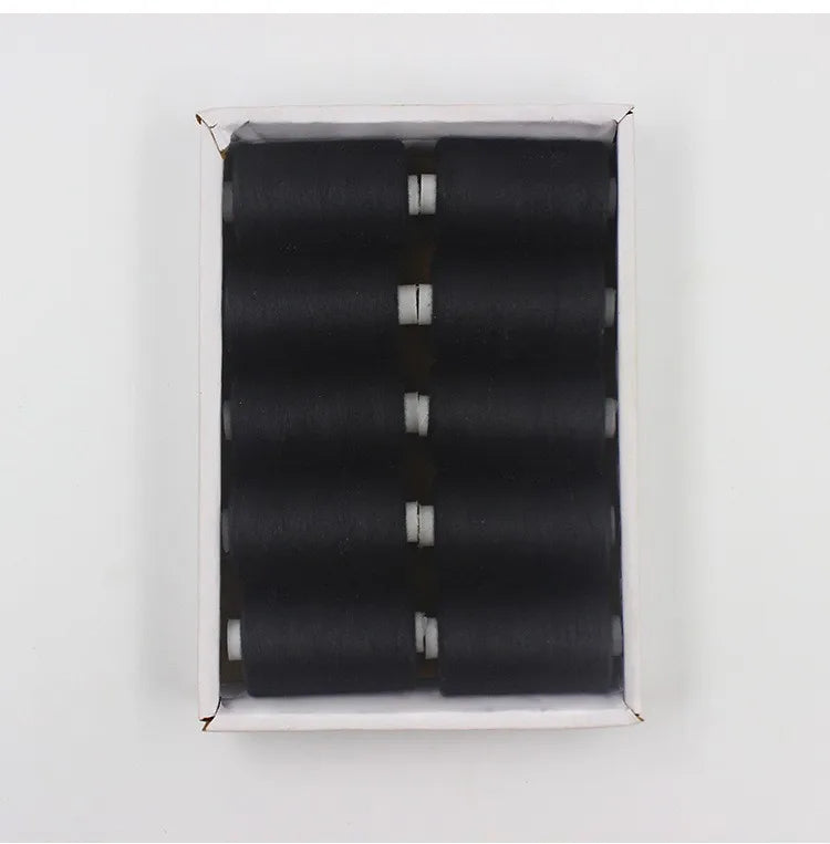 A spool of black polyester sewing thread inside a white plastic container.