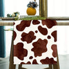 A brown and white abstract pattern linen table runner for rustic kitchen decor