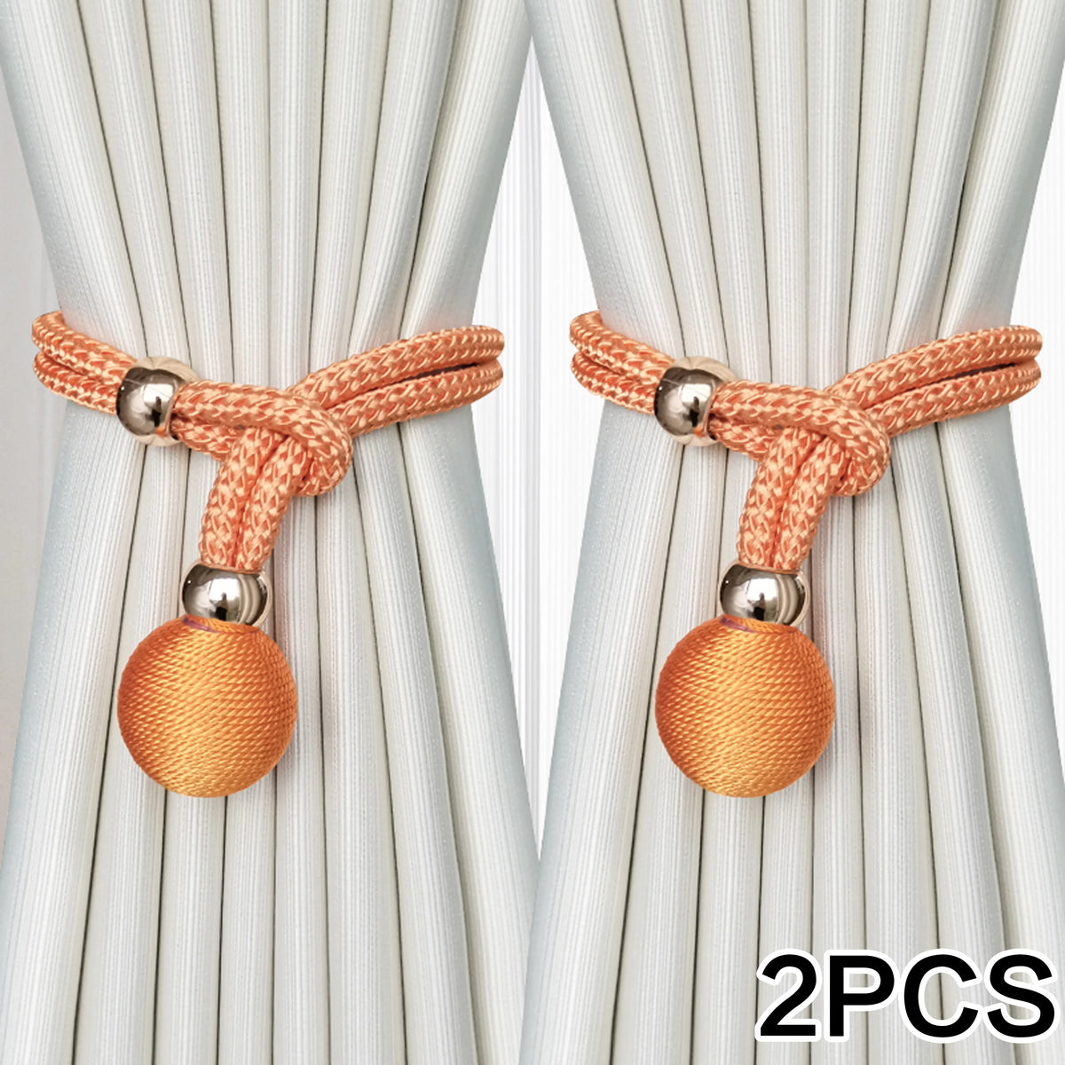 Two sets of adjustable French ball curtain tiebacks in orange thread with silver metal findings