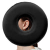 A black comforting ear piercing pillow is shown against a white background.