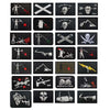 A collection of black embroidered patches featuring various pirate and skull designs with hook and loop backing.