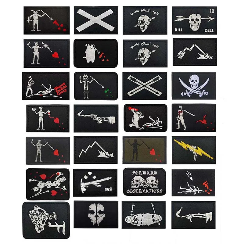 A collection of black embroidered patches featuring various pirate and skull designs with hook and loop backing.