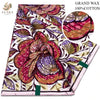 A vibrant African wax print fabric featuring floral patterns in shades of pink, purple, and gold.