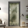 A translucent lace door curtain featuring a sun and moon design hangs in a dark frame.