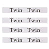 A set of four elastic bed sheet organizer straps, each labeled Twin to Twin.
