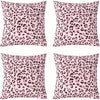 A set of four pink leopard print decorative pillow covers.