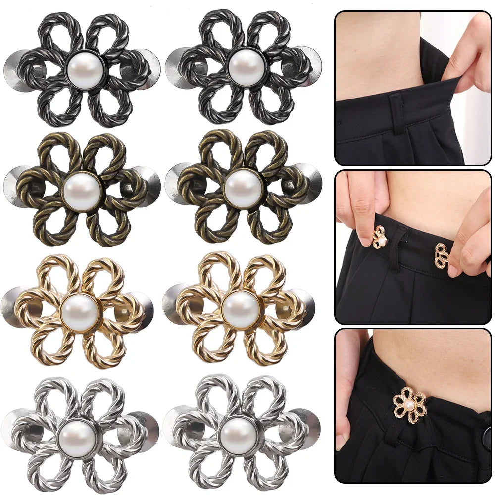 A collection of adjustable metal waist clips in various finishes and designs for pants and jeans.