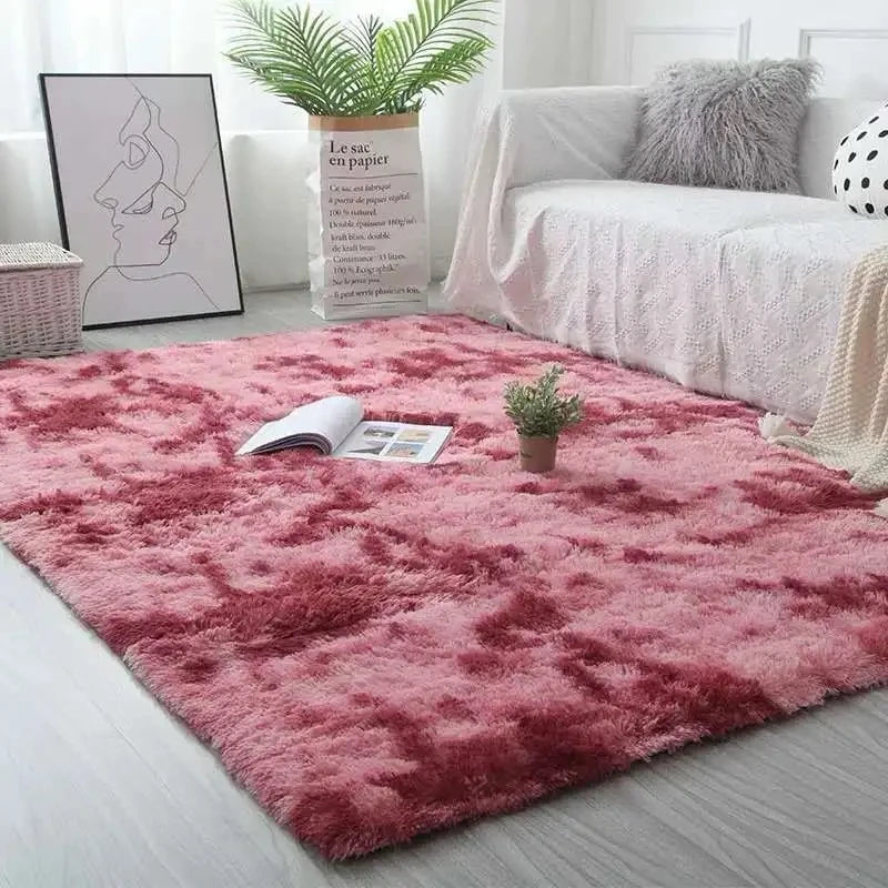 A plush, deep pink velvet anti-slip floor mat placed on a light wood floor in a bright room.