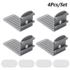 Set of four gray invisible bed sheet clips for anti-slip fixing