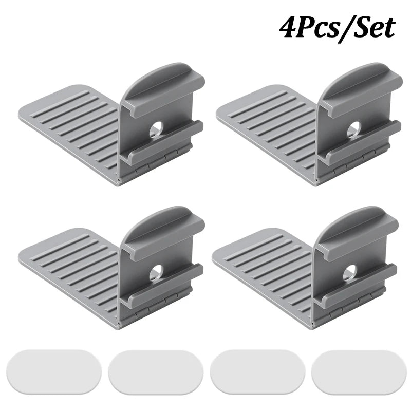Set of four gray invisible bed sheet clips for anti-slip fixing